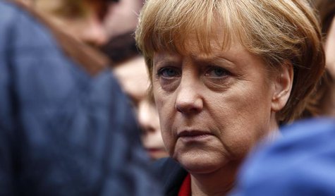 German Chancellor Angela Merkel visits the flood affected centre of Passau, about 200 km (124 miles) north-east of Munich June 4, 2013. REUT German Chancellor Angela Merkel visits the flood affected centre of Passau, about 200 km (124 miles) north-east of Munich June 4, 2013. REUT