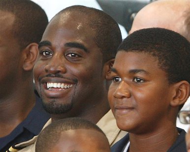 Trayvon Martin (R) poses for a photo with Barrington Irving in Opa-Locka, Florida in this undated handout photo. REUTERS/Experience Aviation Trayvon Martin (R) poses for a photo with Barrington Irving in Opa-Locka, Florida in this undated handout photo. REUTERS/Experience Aviation