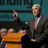 U.S. Senator Mark Udall speaks during a memorial service marking the anniversary of the Tuscon shooting, at the University of Arizona campus U.S. Senator Mark Udall speaks during a memorial service marking the anniversary of the Tuscon shooting, at the University of Arizona campus