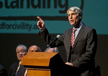 U.S. Senator Mark Udall speaks during a memorial service marking the anniversary of the Tuscon shooting, at the University of Arizona campus U.S. Senator Mark Udall speaks during a memorial service marking the anniversary of the Tuscon shooting, at the University of Arizona campus