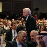 U.S. Senator John McCain walks after the opening ceremony of the World Economic Forum on the Middle East and North Africa at the King Hussei