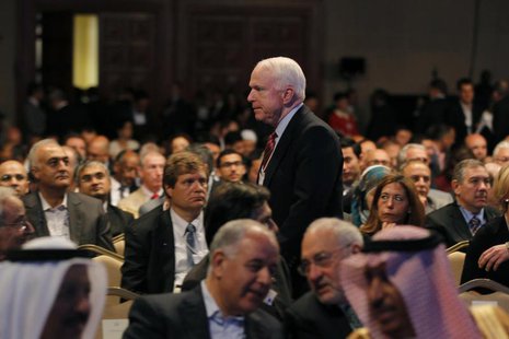 U.S. Senator John McCain walks after the opening ceremony of the World Economic Forum on the Middle East and North Africa at the King Hussei U.S. Senator John McCain walks after the opening ceremony of the World Economic Forum on the Middle East and North Africa at the King Hussei