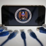 An illustration picture shows the logo of the U.S. National Security Agency on the display of an iPhone in Berlin, June 7, 2013. REUTERS/Paw