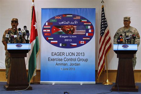 U.S. Army Maj. Gen. Robert Catalanotti (R), director, Exercises and Training Directorate J-7, U.S. Central Command, speaks during a news con U.S. Army Maj. Gen. Robert Catalanotti (R), director, Exercises and Training Directorate J-7, U.S. Central Command, speaks during a news con