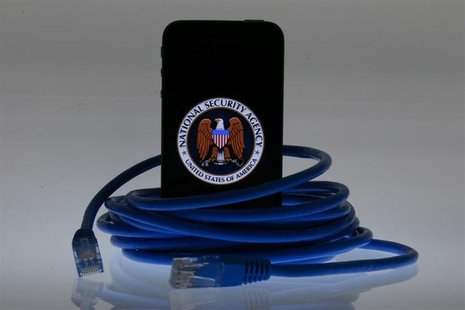 An illustration picture shows the logo of the U.S. National Security Agency on the display of an iPhone in Berlin, June 7, 2013. REUTERS/Paw An illustration picture shows the logo of the U.S. National Security Agency on the display of an iPhone in Berlin, June 7, 2013. REUTERS/Paw