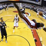 Miami Heat's LeBron James dunks on San Antonio Spurs Danny Green (4) during Game 2 of their NBA Finals basketball playoff in Miami, Florida 