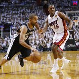 San Antonio Spurs' Tony Parker (L) drives to the net on Miami Heat's Mario Chalmers during the first quarter in Game 2 of their NBA Finals b San Antonio Spurs' Tony Parker (L) drives to the net on Miami Heat's Mario Chalmers during the first quarter in Game 2 of their NBA Finals b