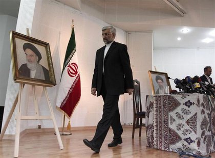 Iran's chief negotiator Saeed Jalili leaves after his news conference at the Iranian Consulate in Istanbul May 16, 2013. REUTERS/Osman Orsal Iran's chief negotiator Saeed Jalili leaves after his news conference at the Iranian Consulate in Istanbul May 16, 2013. REUTERS/Osman Orsal