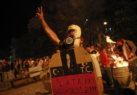 An anti-government protester gestures during a demonstration in central Ankara June 9, 2013. REUTERS/Dado Ruvic An anti-government protester gestures during a demonstration in central Ankara June 9, 2013. REUTERS/Dado Ruvic