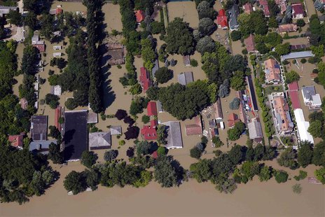 An aerial view of settlements partially submerged in flood waters from the swollen Danube River is pictured in Budapest June 9, 2013. REUTER An aerial view of settlements partially submerged in flood waters from the swollen Danube River is pictured in Budapest June 9, 2013. REUTER