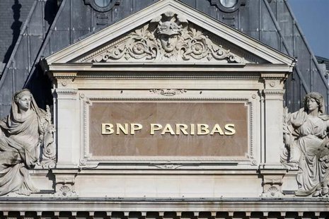 The BNP Paribas plaque is seen on the roof of one of their main banks in central Paris February 18, 2013. REUTERS/Charles Platiau The BNP Paribas plaque is seen on the roof of one of their main banks in central Paris February 18, 2013. REUTERS/Charles Platiau