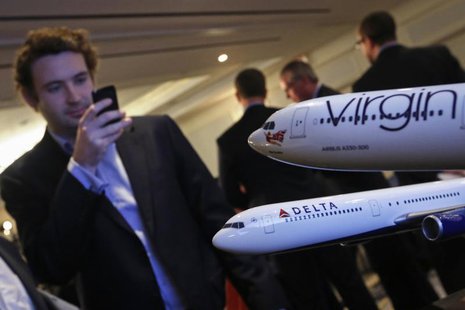 Aircraft models are seen following a news conference to announce the sale of Virgin Atlantic airline to Delta Air Lines, in New York Decembe Aircraft models are seen following a news conference to announce the sale of Virgin Atlantic airline to Delta Air Lines, in New York Decembe