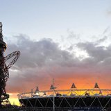 The sun sets behind the Olympic Stadium and Orbit tower at the Olympic Park in Stratford in east London March 7, 2012. REUTERS/Toby Melville The sun sets behind the Olympic Stadium and Orbit tower at the Olympic Park in Stratford in east London March 7, 2012. REUTERS/Toby Melville