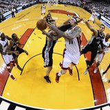 Miami Heat's Chris Andersen (11) goes to the basket against San Antonio Spurs' Tiago Splitter during Game 2 of their NBA Finals basketball p Miami Heat's Chris Andersen (11) goes to the basket against San Antonio Spurs' Tiago Splitter during Game 2 of their NBA Finals basketball p