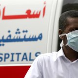 A man, wearing a surgical mask as a precautionary measure against the novel coronavirus, walks near a hospital in Khobar city in Dammam May 