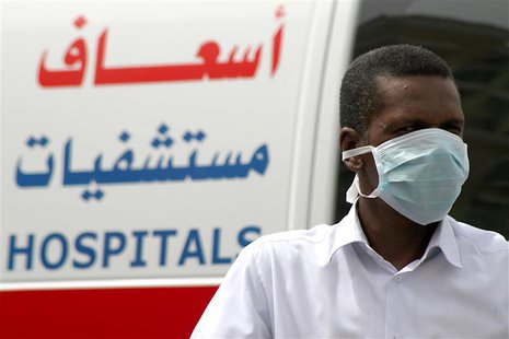 A man, wearing a surgical mask as a precautionary measure against the novel coronavirus, walks near a hospital in Khobar city in Dammam May A man, wearing a surgical mask as a precautionary measure against the novel coronavirus, walks near a hospital in Khobar city in Dammam May