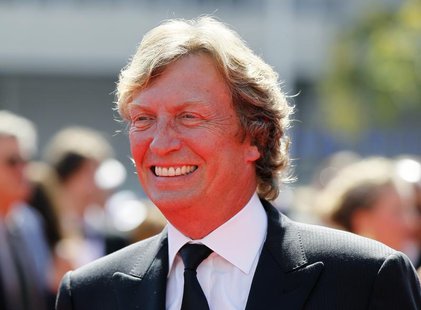 British television and film director and producer Nigel Lythgoe arrives at the 2012 Primetime Creative Arts Emmy Awards in Los Angeles Septe British television and film director and producer Nigel Lythgoe arrives at the 2012 Primetime Creative Arts Emmy Awards in Los Angeles Septe