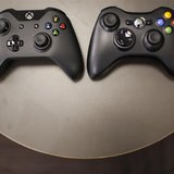 The new Xbox One controller (R), next to the previous controller during a press event unveiling Microsoft's new Xbox One in Redmond, Washing