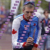 Canada's Ryder Hesjedal signs his name at the start of the men's cycling road race at the London 2012 Olympic Games July 28, 2012. REUTERS/P