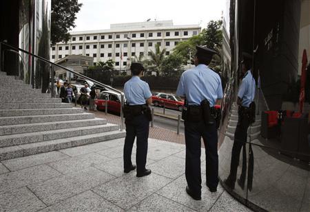 Policemen stand opposite the Consulate of the United States in Hong Kong June 10, 2013.
Credit: Reuters/Bobby Yip Policemen stand opposite the Consulate of the United States in Hong Kong June 10, 2013.
Credit: Reuters/Bobby Yip