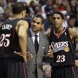 Former Philadelphia 76ers head coach Maurice Cheeks (C) talks with players Rodney Carney (L) and Louis Williams during the second half of Ga