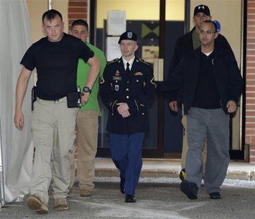 U.S. Army Private First Class Bradley Manning (C) departs the courtroom after day four of his court martial at Fort Meade, Maryland June 10, U.S. Army Private First Class Bradley Manning (C) departs the courtroom after day four of his court martial at Fort Meade, Maryland June 10,