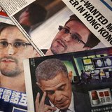Photos of Edward Snowden, a contractor at the National Security Agency (NSA), and U.S. President Barack Obama are printed on the front pages Photos of Edward Snowden, a contractor at the National Security Agency (NSA), and U.S. President Barack Obama are printed on the front pages