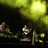 English folk rock band Mumford and Sons' Marcus Mumford (2nd L), Winston Marshall (2nd R), Ted Dwane (R) and Ben Lovett (L) perform on the m