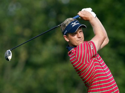 Luke Donald of England watches his tee shot on the first hole during the first round of the Memorial Tournament at Muirfield Village Golf Cl Luke Donald of England watches his tee shot on the first hole during the first round of the Memorial Tournament at Muirfield Village Golf Cl