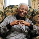 Former South African president Nelson Mandela chats with Britain's Prime Minister Gordon Brown (not pictured) during a meeting at his hotel Former South African president Nelson Mandela chats with Britain's Prime Minister Gordon Brown (not pictured) during a meeting at his hotel