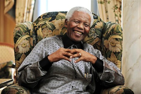 Former South African president Nelson Mandela chats with Britain's Prime Minister Gordon Brown (not pictured) during a meeting at his hotel Former South African president Nelson Mandela chats with Britain's Prime Minister Gordon Brown (not pictured) during a meeting at his hotel