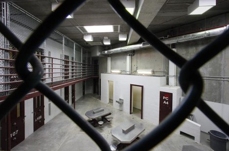 The interior of an unoccupied communal cellblock is seen at Camp VI, a prison used to house detainees at the U.S. Naval Base at Guantanamo B The interior of an unoccupied communal cellblock is seen at Camp VI, a prison used to house detainees at the U.S. Naval Base at Guantanamo B