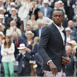 Jamaican sprinter Usain Bolt walks to present trophies during the victory ceremony following the men's singles final match between Rafael Na Jamaican sprinter Usain Bolt walks to present trophies during the victory ceremony following the men's singles final match between Rafael Na