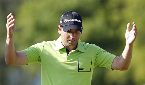 Spain's Sergio Garcia gestures as he walks down the 14th fairway during a practice round for the 2013 U.S. Open golf championship at the Mer Spain's Sergio Garcia gestures as he walks down the 14th fairway during a practice round for the 2013 U.S. Open golf championship at the Mer