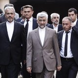 Iran's chief nuclear negotiator Saeed Jalili (C) arrives at the Iranian Consulate before his meeting with European Union foreign policy chie