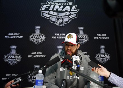 Chicago Blackhawks goalie Corey Crawford answers a question from the media during a news conference for the NHL Stanley Cup finals to be pla Chicago Blackhawks goalie Corey Crawford answers a question from the media during a news conference for the NHL Stanley Cup finals to be pla