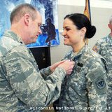 Maj. Gen. Donald Dunbar, the adjutant general of Wisconsin, awards the Purple Heart to Spc. Lindsay Peterson, of Green Bay, Wis. (courtesy of WI National Guard).