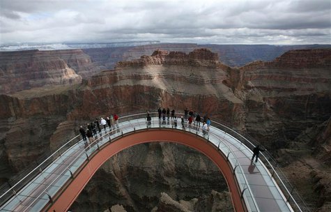 A skywalk extends out over the Grand Canyon in this view from the incomplete building that houses the skywalk, on the Hualapai Indian Reserv A skywalk extends out over the Grand Canyon in this view from the incomplete building that houses the skywalk, on the Hualapai Indian Reserv