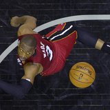 Miami Heat Dwyane Wade looks for a rebound against the San Antonio Spurs during Game 3 of their NBA Finals basketball playoff in San Antonio Miami Heat Dwyane Wade looks for a rebound against the San Antonio Spurs during Game 3 of their NBA Finals basketball playoff in San Antonio