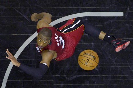 Miami Heat Dwyane Wade looks for a rebound against the San Antonio Spurs during Game 3 of their NBA Finals basketball playoff in San Antonio Miami Heat Dwyane Wade looks for a rebound against the San Antonio Spurs during Game 3 of their NBA Finals basketball playoff in San Antonio