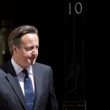 Britain's Prime Minister David Cameron waits at Downing Street to meet Columbia's President Juan Manuel Santos Calderon in London June 6, 20