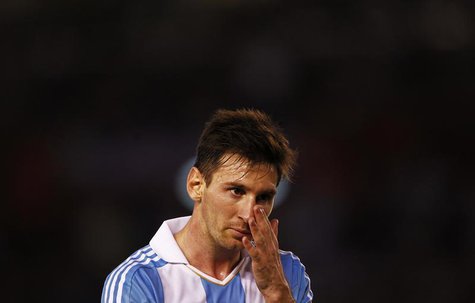 Argentina's Leonel Messi pauses on the field as they played Venezuela in a 2014 World Cup qualifying soccer match in Buenos Aires March 22, Argentina's Leonel Messi pauses on the field as they played Venezuela in a 2014 World Cup qualifying soccer match in Buenos Aires March 22,