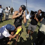 Australian long-distance swimmer Chloe McCardel adjusts her swimming cap before attempting to swim to Florida from Havana June 12, 2013. REU