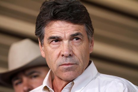 Texas Governor Rick Perry answers questions from the media after taking an aerial tour over the fertilizer plant explosion site in West, Tex Texas Governor Rick Perry answers questions from the media after taking an aerial tour over the fertilizer plant explosion site in West, Tex