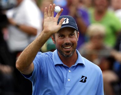 Matt Kuchar of the U.S. celebrates on the 18th green after winning the Memorial Tournament at Muirfield Village Golf Club in Dublin, Ohio Ju Matt Kuchar of the U.S. celebrates on the 18th green after winning the Memorial Tournament at Muirfield Village Golf Club in Dublin, Ohio Ju
