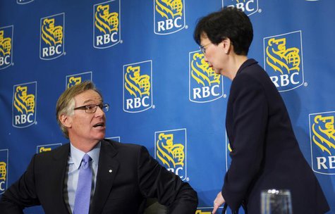 Royal Bank of Canada (RBC) President and CEO Gordon Nixon speaks to Chief Financial Officer Janice Fukakusa (R) after a news conference foll Royal Bank of Canada (RBC) President and CEO Gordon Nixon speaks to Chief Financial Officer Janice Fukakusa (R) after a news conference foll