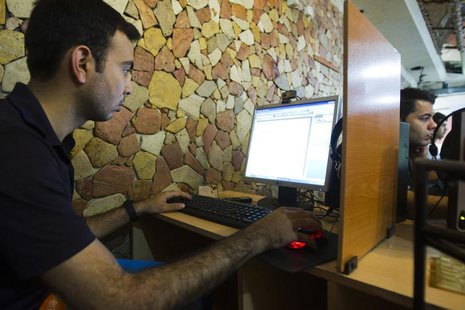A customer uses a computer at an internet cafe in Tehran May 9, 2011.REUTERS/Raheb Homavandi A customer uses a computer at an internet cafe in Tehran May 9, 2011.REUTERS/Raheb Homavandi