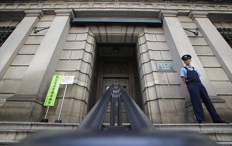 A security personnel stands guard at the Bank of Japan building in Tokyo, May 22, 2013. REUTERS/Yuya Shino A security personnel stands guard at the Bank of Japan building in Tokyo, May 22, 2013. REUTERS/Yuya Shino