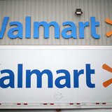 Wal-Mart Stores Inc logos is seen at a company distribution center in Bentonville, Arkansas, in this June 6, 2013 file photo. REUTERS/Rick W Wal-Mart Stores Inc logos is seen at a company distribution center in Bentonville, Arkansas, in this June 6, 2013 file photo. REUTERS/Rick W