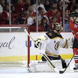 Chicago Blackhawks' Andrew Shaw (65) scores the game-winning goal past Boston Bruins goalie Tuukka Rask during triple overtime in Game 1 of 